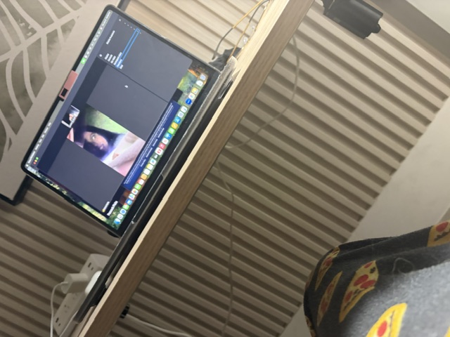 A long-distance video call displayed on a laptop on June 4